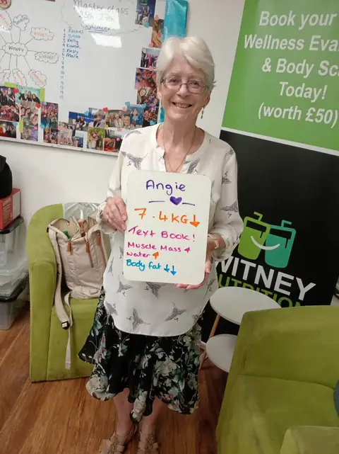 Assessment board held by a member of the Witney Nutrition Club